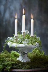 Wall Mural - Christmas decoration with candles, moss, winter flowers