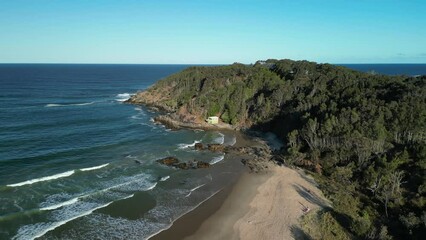 Wall Mural - Aerial views of tropical beach and ocean waves in Coffs  Harbour, New South Wales, Australia