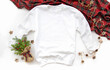 Close up white blank template sweatshirt hoodie with copy space and Christmas Holiday concept. Top view and white background