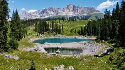 drone photo Carezza Lake, lago di carezza, Karersee dolomites italy europe