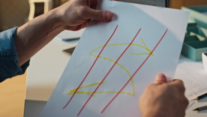 Wall Mural - Freelancer hands showing sketch at sunny office close up. Man creating at desk