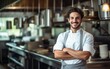 © piai - Male chef folded his arms and looking at the camera exuding pride and happiness