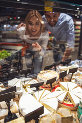 Wall Mural - Couple at the supermarket