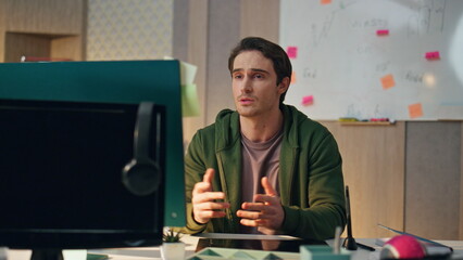 Wall Mural - Relaxed specialist greeting display computer at video call. Man opening notebook