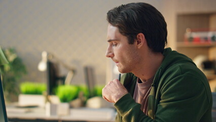 Wall Mural - pensive man watching computer display office closeup. artist drawing hand tablet