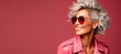 © QuantumVisions - middle age happy smiling woman on pink background. Banner design with space for text