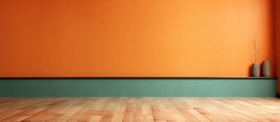 Orange cement wall and wooden floor in an empty room background