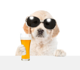 Poster - Golden retriever puppy with light beer peeking above white banner. isolated on white background.