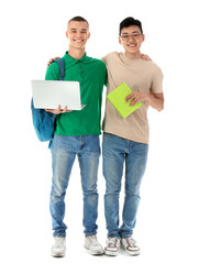 Canvas Print - Happy male students with notebooks and laptop isolated on white background