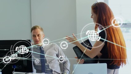 Poster - Animation of network of digital icons against diverse man and woman discussing at office