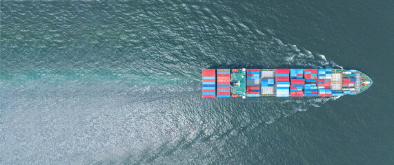 top view Cargo Container ship with contrail in the ocean ship carrying container and running for import export concept technology freight shipping by ship..