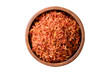 Dried safflower in wooden bowl, Top view