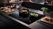 the sleek induction cooktop, the kitchen's newest gem
