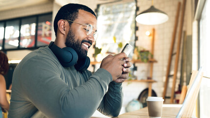 Aufkleber - Remote work, cafe and man with a phone for a chat, communication or online search. Smile, entrepreneur or freelance worker typing on a mobile app at a coffee shop for contact, internet or connection