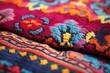 fragment of a brightly coloured oriental rug