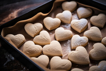 Heart shaped cookies on baking tray