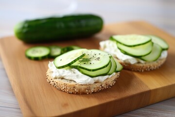 Sticker - bagel with cream cheese and sliced cucumber