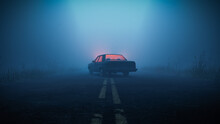 Car With Eerie Glowing Light Inside Parked In Middle Of Road In Foggy Moody Forest During Blue Hour
