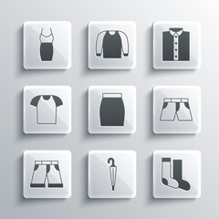 Sticker - Set Umbrella, Socks, Short or pants, Skirt, T-shirt, Woman dress and Shirt icon. Vector