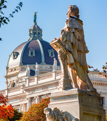 Wall Mural - Wolfgang Amadeus Mozart statue in autumn Burggarten park, Vienna, Austria