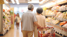 Rear View Of Senior Asian Couple Grocery Shopping In Supermarket, AI Generated Image