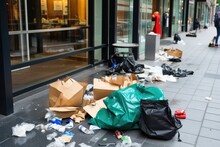torn shopping bags and stolen goods scattered