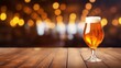 Glass of beer on wooden board and blurred bar background.Free space for your decoration.