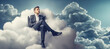 businessman sitting on the cloud in the sky, contemplating his career aspirations and goals, highlighting the idea of striving for success in the corporate world.