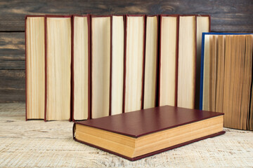 Wall Mural - books on wooden table. Back to school. Education business concept. Copy space for text.