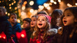 A choir of children singing carols on a festively decorated stage with onlookers gathered around.