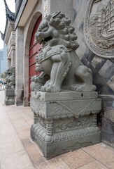 Canvas Print - stone lion statue in the city