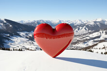 Delightful Red Sculpture In The Form Of A Heart On A Ski Slope Travel Destinations In The Mountains In Winter