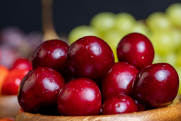 Wall Mural - Sweet fresh cherries with other products