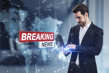 Canvas Print - Attractive young caucasian man using tablet with creative hi-tech breaking news and polygonal map hologram on blurry office interior background. Digital communication concept. Double exposure.