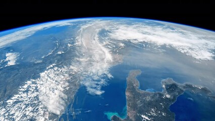 Wall Mural - orbiting over planet earth. beautiful clouds and atmosphere from above. view from international spac