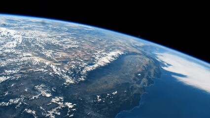 Wall Mural - orbiting over planet earth. beautiful clouds and atmosphere from above. view from international spac