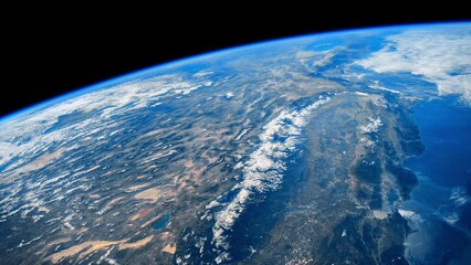 Wall Mural - orbiting over planet earth. beautiful clouds and atmosphere from above. view from international spac