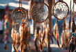 Native American dream catchers hanging on display at the outdoor market