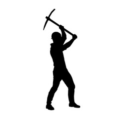 Silhouette of a man in worker costume carrying pick axe tool in action pose.