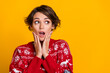 Photo of impressed girl with bob hairstyle dressed red sweatshirt palms on face staring at empty space isolated on yellow color background