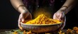 Traditional Indian kitchen preparing turmeric powder for curry an Ayurvedic antiseptic and antiviral spice with a stone mortar in Kerala India and Sri Lanka With copyspace for text
