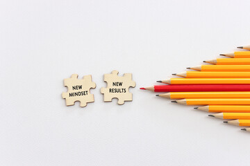 Poster - top view image of pencils with puzzle and the text new mindset. success and personal development concept