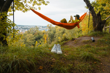 Sticker - chilling woman laying down in hammock