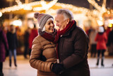 Happy active senior couple skating on a Christmas skating rink. Retired family ice skating on winter holidays, embodying a healthy lifestyle