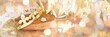 Galette des rois, french kingcake with a  crown, panoramic holiday bokeh lights web banner