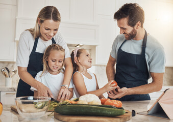 Wall Mural - Love, cooking and family in the kitchen together for bonding and preparing dinner, lunch or supper. Happy, smile and girl children cutting vegetables or ingredients with parents for a meal at home.