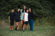 © Austockphoto - Aboriginal family portrait outdoors