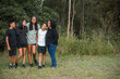 © Austockphoto - Aboriginal family portrait outdoors