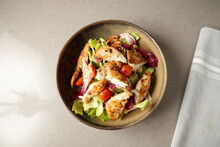Overhead Shot Of Gourmet Chicken Caesar Salad