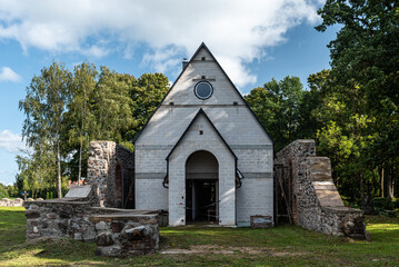 Wall Mural - Lutheran church and ruins in Dzukste, Latvia.